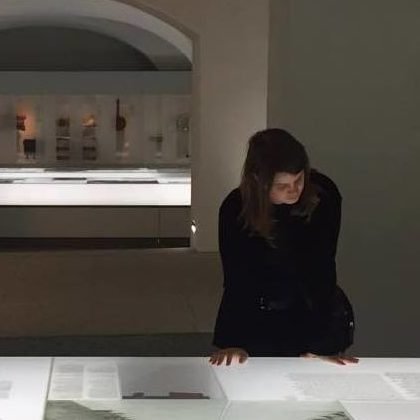 Kris viewing an exhibition in a museum